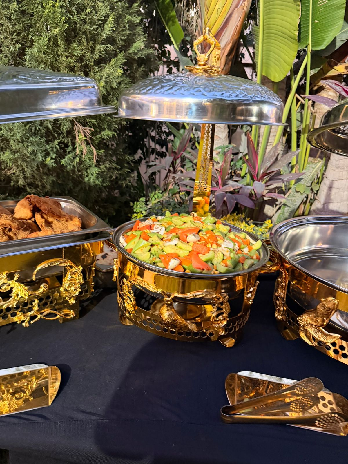 A chef preparing a colourful catered meal 2